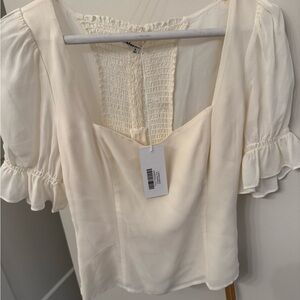 reformation Cream Smocked Ruffle Blouse